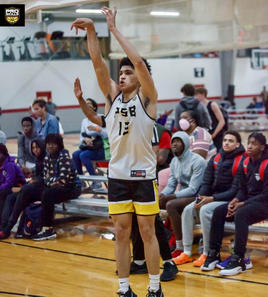 Highschool Pro Skills Basketball Player takes a jumpshot at a youth basketball game