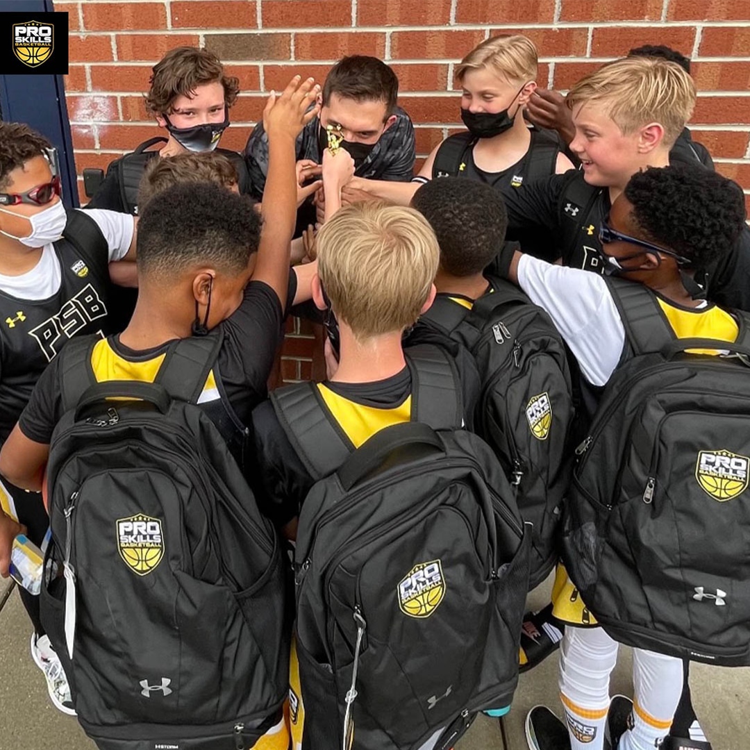 Pro Skills Basketball Club Team huddling after a game